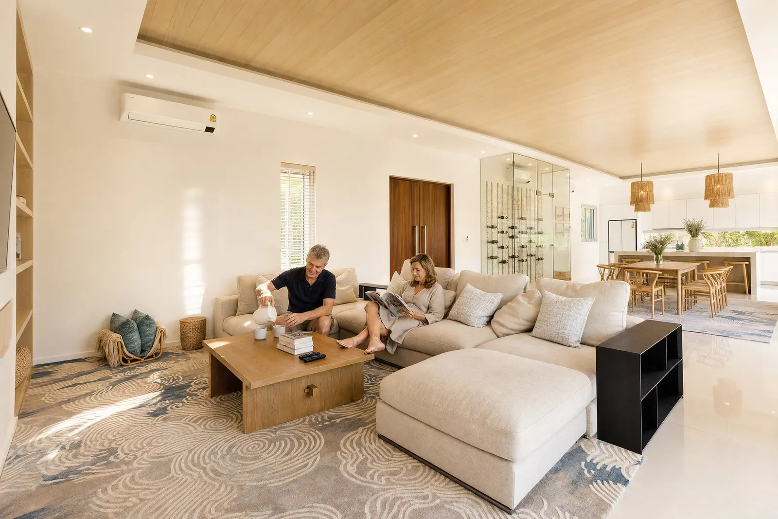 A sunlit JG living room with the garden beyond