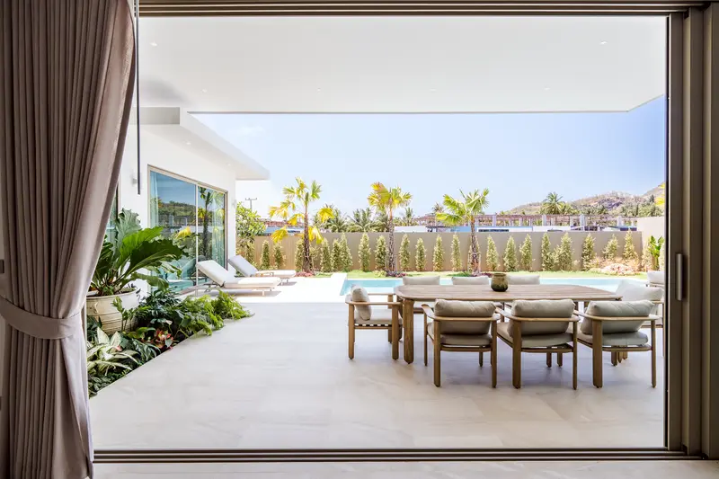 Curtains framing the doors to a JG terrace