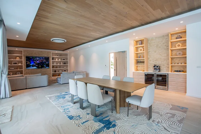 A wood ceiling over the living and dining room of a JG villa, Palm Hills
